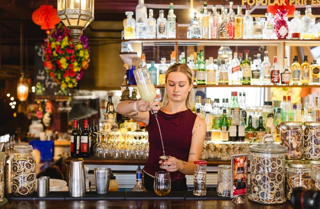 Bartender making a cocktail at Monsoon Poon.