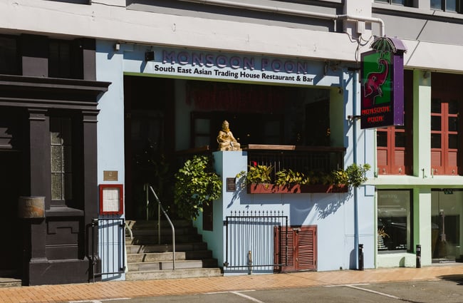 Light blue building exterior of Monsoon Poon.