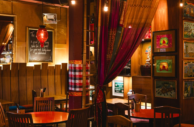 Dimly lit dining room of Monsoon Poon.
