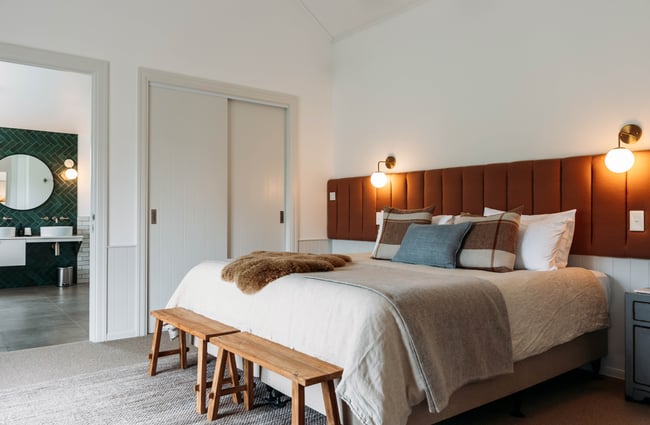 Bed in the accommodation suite at Monte Christo Winery.