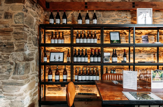 Bottles of wine on shelves at Monte Christo Winery.