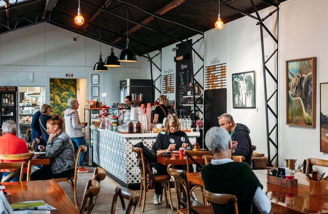 People dining inside MOOMAA Cafe and Design Store in Rangitikei.