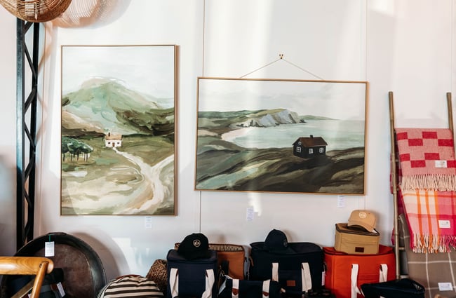 Works of art on a wall at MOOMAA Cafe and Design Store in Rangitikei.