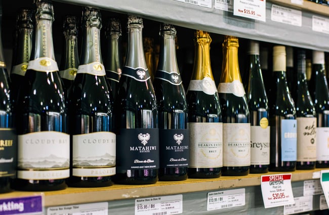 Close up of bottles of sparkling wine.