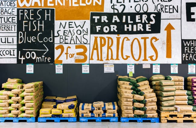 Mural at Moore Wilson's with pallet of food below.