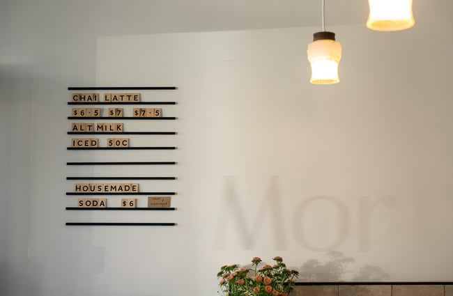 A menu on a cafe wall.