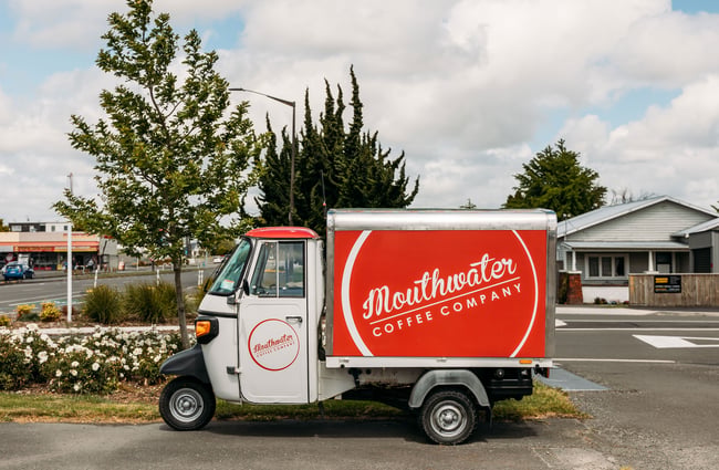 A small red coffee caravan.