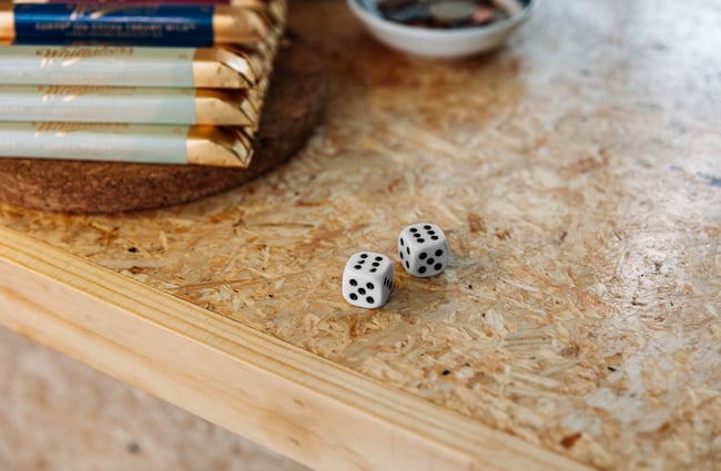 Two dice on a counter.