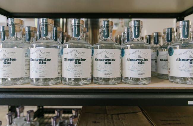 Shelves of Shearwater Gin at Mt Fyffe Distillery, Kaikōura.