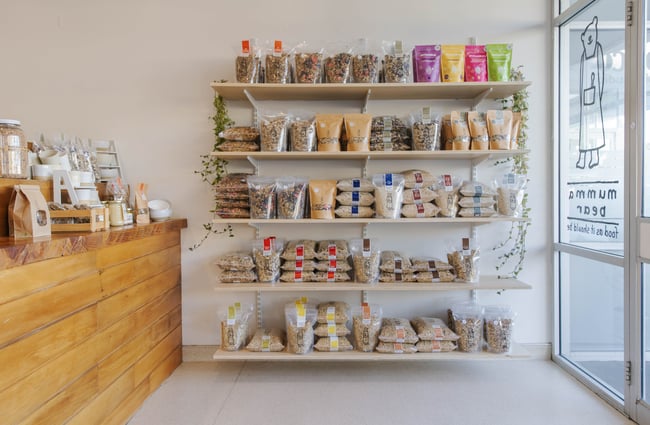 Shelves of porridges, mueslis and other items in Mumma Bear.