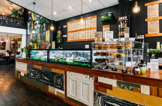 The large counter inside a cafe.