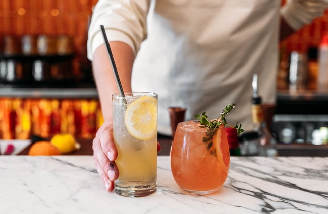 Two cocktails are on the bar at Muttonbird, Wānaka.