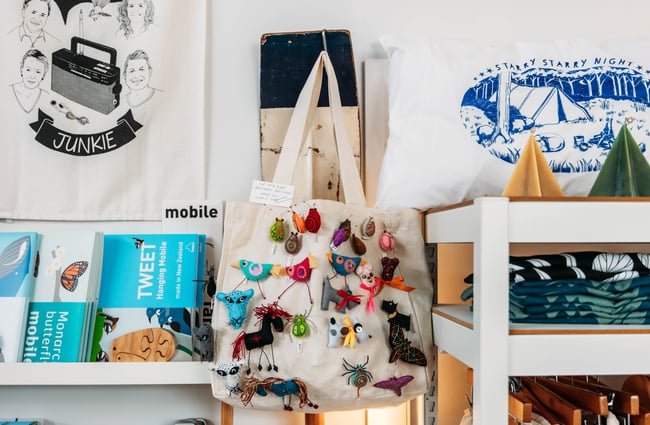 A bag and other trinkets on display.