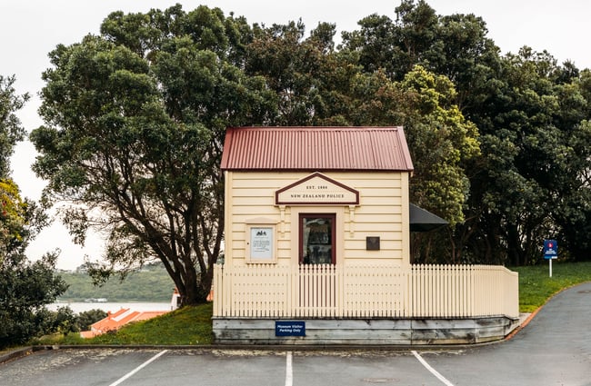 The exterior of an old school police station.