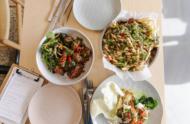 Table of delicious food at Niche Cafe and Eatery in Sumner.