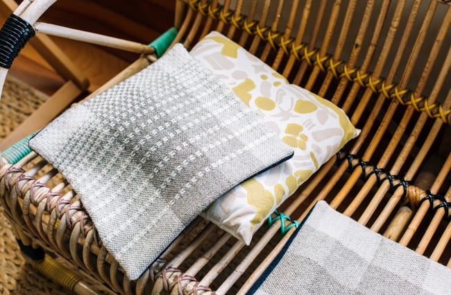 Woven pillowcase on a chair.