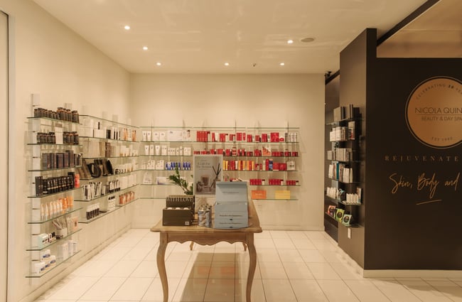 Products on display on shelves inside a day spa.