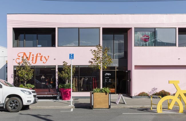 Bright pink building exterior of Nifty.