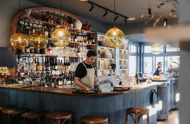 Staff working behind the counter at No.7 Balmac.