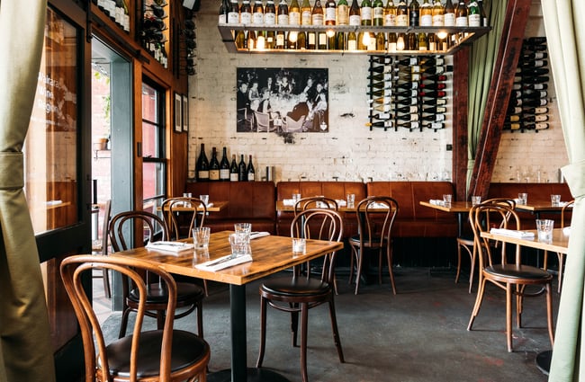 An empty dining area inside Noble Rot in Wellington.