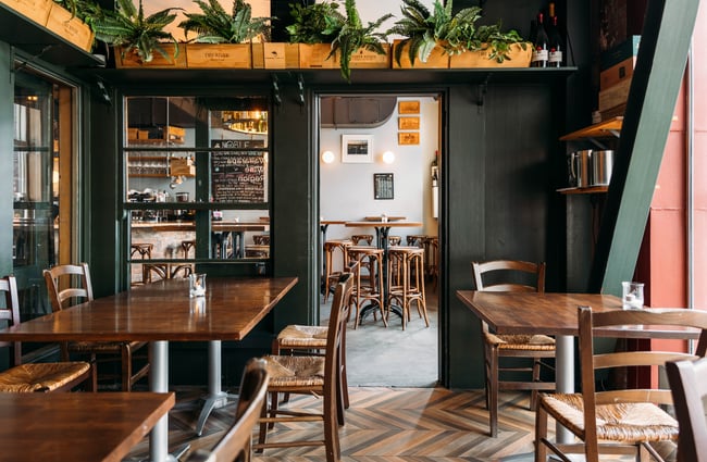 A seating area inside Noble Rot wine bar in Wellington.