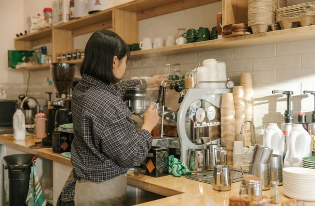 Back of barista making coffee at NOKI in Christchurch