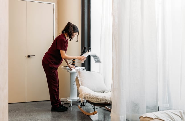 A woman working with a chair.