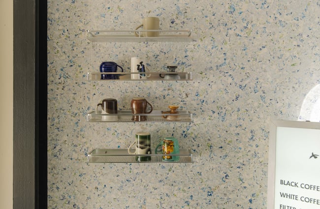 Keep cup wall at Odds Coffee.