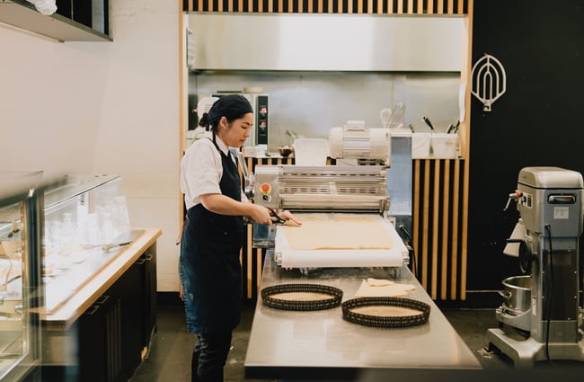 A chef making pastries.