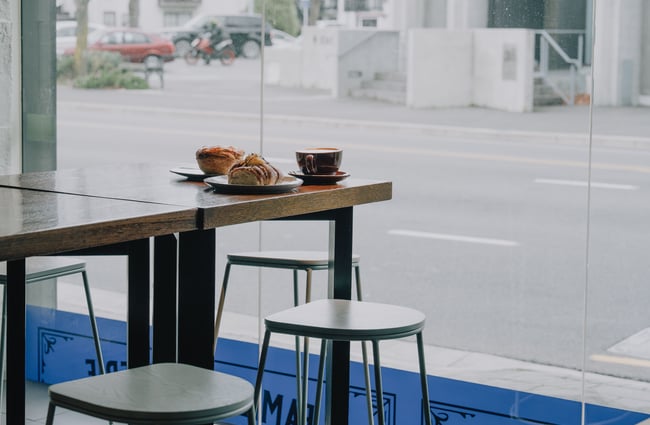 Pastries and coffee on a table.