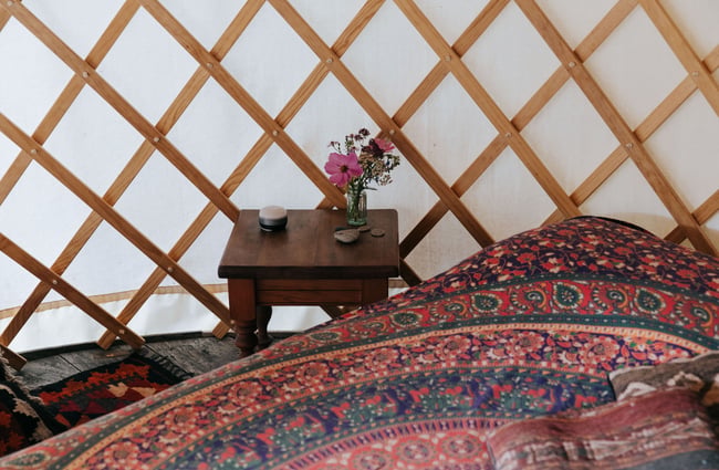 A bedside table at Okuti Garden in Little River.