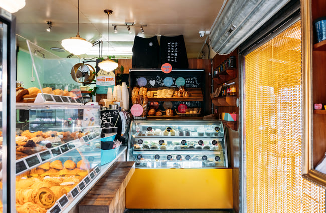 Full cabinets of bakery treats at Olde Beach Bakery.