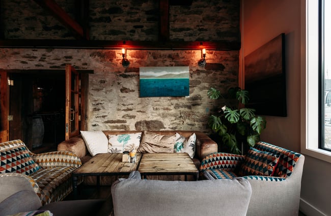 The lush interior of a restaurant seating area.