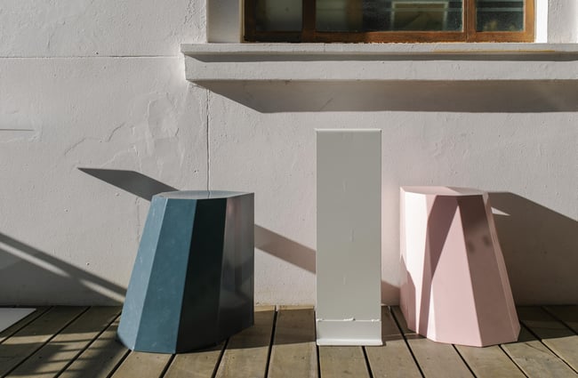 Two Arnold stools sitting in the sunshine