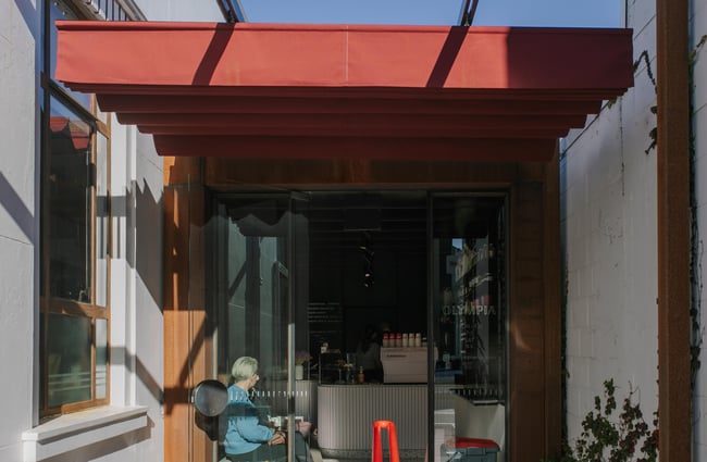 The tiny entrance to Olympia in Christchurch.