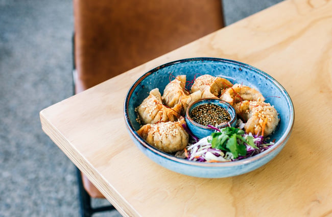 Dumplings in a bowl from On A Roll.