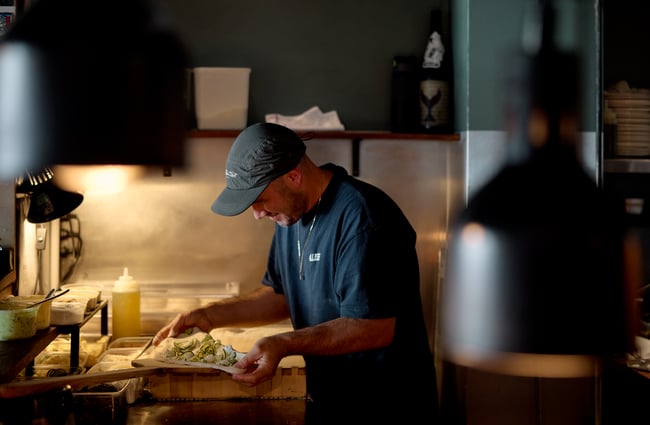 Chef making pizza at OOH-FA in Auckland