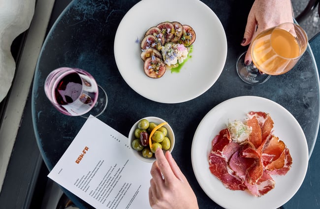 Prosciutto and fig dish on table at OOH-FA in Auckland