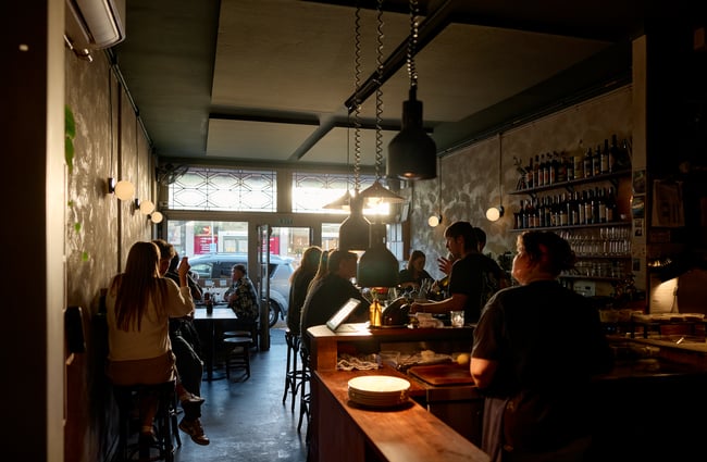 Sunlit dining room at OOH-FA in Auckland