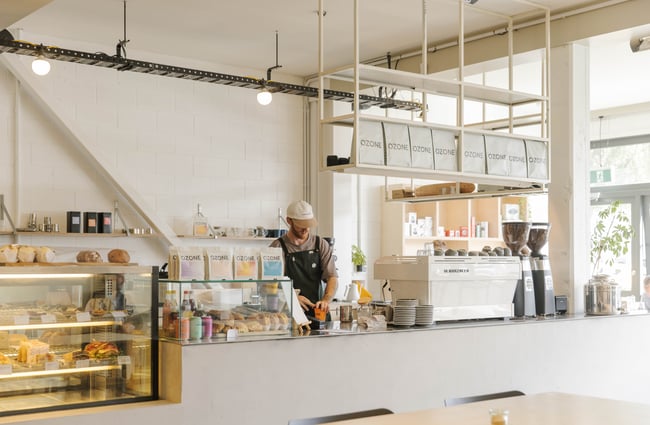 Barista behind the counter at Ozone Coffee Walker Street.