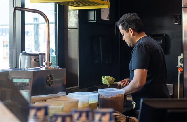 The chef is in the kitchen at Paleta Gelateria making new gelato flavours.