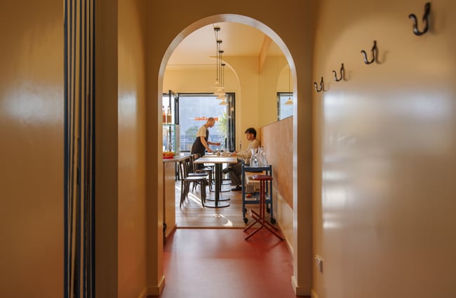 Looking through the hallway to the cafe area at Peaches.