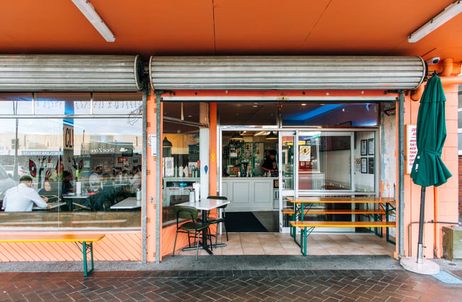 Outdoor seating benches at  Peach's Hot Chicken, Auckland.