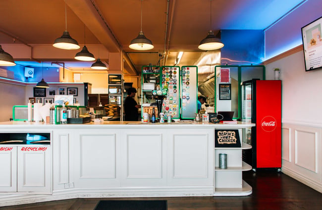 Till area and kitchen at  Peach's Hot Chicken, Auckland.
