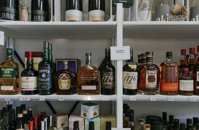 Close up of whiskey bottles on shelves at Pembroke Wines & Spirits, Wānaka.