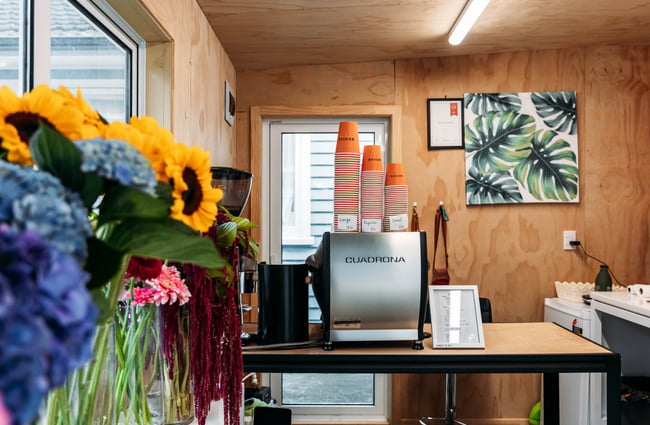 Flowers and coffee machine at Petals.