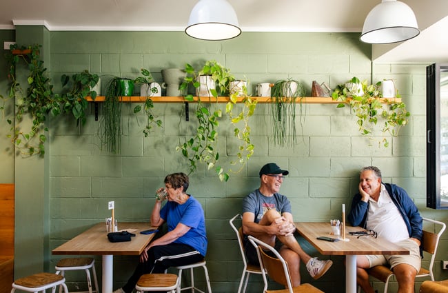 Customers sitting at tables at Pete & Mary's Eatery.