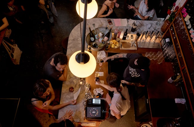 Looking down at the bar area of Pici in Auckland from the top of the stairs