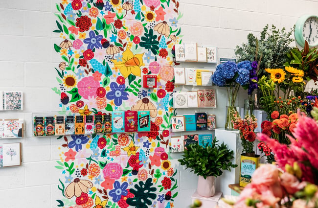 Colourful cards on a wall.