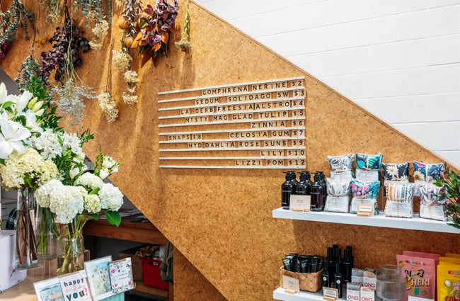 Gifts on display on shelves.